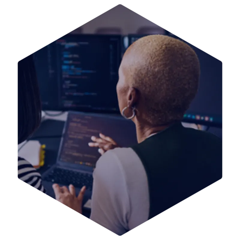 ISW software development experts collaborating on coding and app development, creating secure and scalable solutions in a modern workspace.